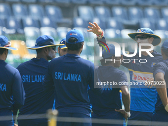 Sri Lankan interim head coach Nic Pothas instructs the Sri Lankan cricket players ahead of the Test match against the visiting Zimbabwe cric...