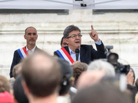 Jean-Luc Melenchon speaks as supporters of political party LFI take to the streets of Paris, France on July 12, 2017 to protest the recently...