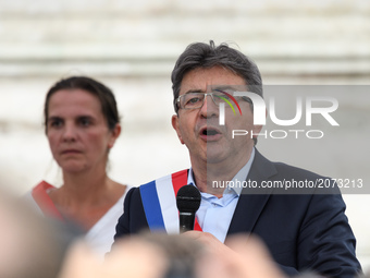 Jean-Luc Melenchon speaks as supporters of political party LFI take to the streets of Paris, France on July 12, 2017 to protest the recently...