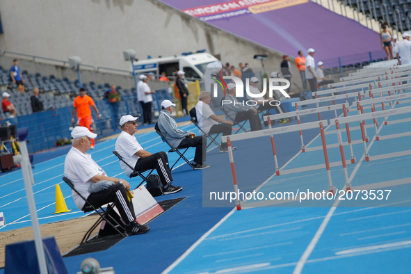 Track umpires are seen ahead of the 100 meter hurdles event during the U23 European Athletics Championships on 13 July, 2017 in Bydgoszcz, P...