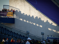 Shadhows of spectators are seen projected on a wall of the Zawisza stadium at the end of the first day of the U23 European Athletics Champio...