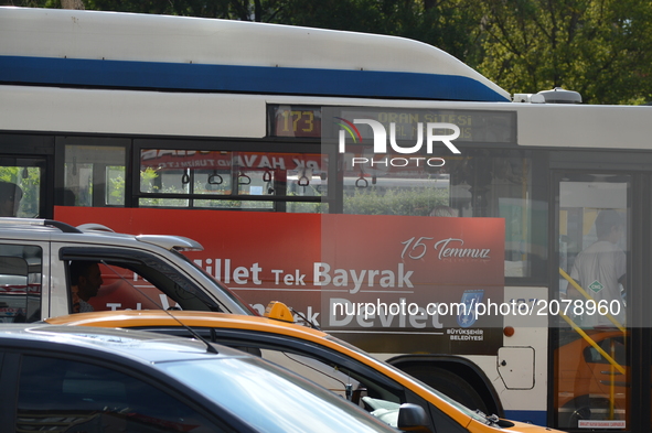 A banner is seen on a public transportation vehicle marking the 1st anniversary of Turkey's failed coup attempt in Ankara, Turkey on July 14...