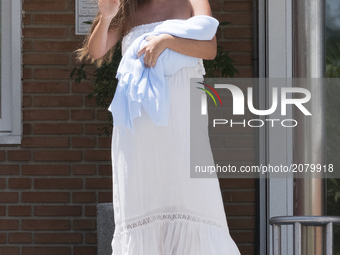Malena Costa, wife of Mario Suárez, poses with her son Mario after leaving the hospital in Madrid, Spain, on 15 July 2017. The model gave bi...