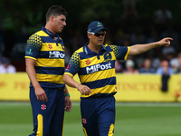 L-R Glamorgan's Marchant de Lange and Glamorgan's Jacques Rudolph
during NatWest T20 Blast match between Essex Eagles and Glamorgan at The C...