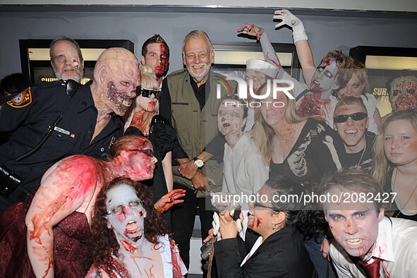 George A. Romero & Zombies attend the premiere of 'Survival of the Dead' at Village East Cinema on May 16, 2010 in New York City.