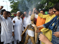 Supporters of  Muslim Rashtriya Mancha  burn effigy Xi Jinping President of China  and protest the ban for chanciness products in India on J...