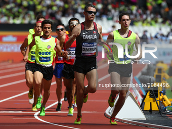 Jason Joseph Dunkerley of Canada and Jermie Nathaniel Venne compete in Men's 1500m  T11 Round 1 Heat 1 during IPC World Para Athletics Champ...