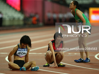 L-R Min Jae Jeon  of Korea and Yiting Shi of China after Women's 200m T36 Final   during IPC World Para Athletics Championships at London St...