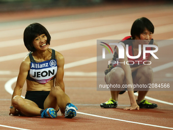 L-R Min Jae Jeon  of Korea and Yiting Shi of China after Women's 200m T36 Final  during IPC World Para Athletics Championships at London Sta...