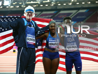 L-R Tyson Gunter of USA, Breanna Clark of USA winner of Women's 400m T20 with a World Record  and Isaac jean paul of USA celebrates a World...