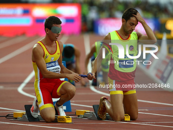 Gerard Descarrega Puigdevall with Guida Marcos Blanquino Exposito compete in Men's 400m T11 Final 
 during IPC World Para Athletics
Champion...