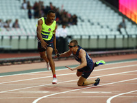 Timothee Adolphe  with Guide Jeffrey Lami compete in Men's 400m T11 Final 
 during IPC World Para Athletics
Championships at London Stadium...