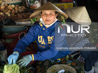 Portrait of a woman selling vegetables at Hoian Market (Vietnam)
HOIAN-VIETNAM (