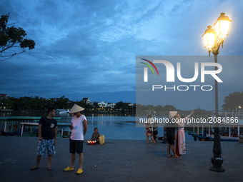 A couple is doing a selfie at sunset in the tourist town of Hoian (Vietnam)
HOIAN-VIETNAM (