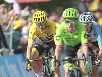 (From L) Great Britain's Christopher Froome wearing the overall leader's yellow jersey, France's Romain Bardet and Colombia's Rigoberto Uran...