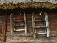 A view of a wooden sleghs attached to the wall outside a house, in the Folk Culture Open-Air Museum in Kolbuszowa. 
On Sunday, July 16, 2017...