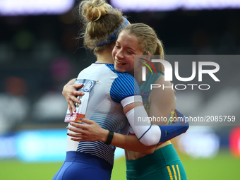  Isis Holt of Australia celebrates World Record with Maria Lyle of Great Britain Women's 100m F35 Final
during World Para Athletics Champio...