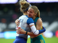 Isis Holt of Australia celebrates World Record with Maria Lyle of Great Britain Women's 100m F35 Final
during World Para Athletics Champio...