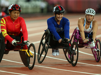 L-R Hongzhuan Zhou of China , Chelsea McClammer of USA and Samantha Kinghorn of Great Britain  compete Women's' 400m T53 Final
during World...