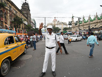 Indian Traffic police control the traffic on July 20, 2017 in Kolkata, India. (