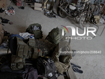UKRAINE - AUGUST 7: A motor repair shed  with soldiers' belongings inside (