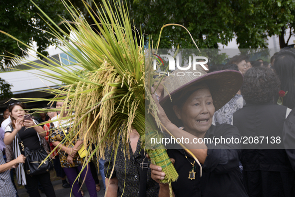 Supporters of ousted former Thai Prime Minister Yingluck Shinawatra waiting for her arrival at the Supreme Court in Bangkok, Thailand on Jul...