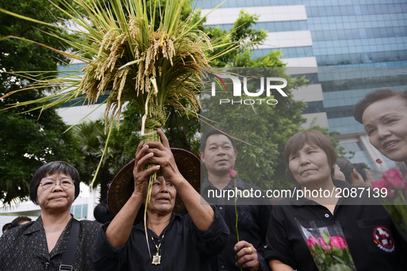 Supporters of ousted former Thai Prime Minister Yingluck Shinawatra waiting for her arrival at the Supreme Court in Bangkok, Thailand on Jul...