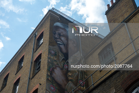A giant portrait of Nelson Mandela is seen on a wall of Camden, London, on July 21, 2017. The mural has been made to mark 99 years since Nel...