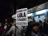Demontrators take part in a protest against president Michel Temer government's labor and security reforms and against the prosecution of fo...