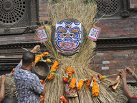 Nepalese devotees making straw effigy demon Ghantakarna during the Gathemangal festival celebrated at Bhaktapur, Nepal on Friday, July 21, 2...