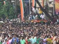 Supporters of the Indian Trinamool Congress Party (TMC) attend a mass meeting addressed by West Bengal chief minister and TMC chief Mamata B...