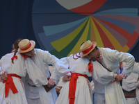 Members of 'Lasowiacy' group from Winterthur, Switzerland, during their performance on the first day of the 17th edition of World Festival o...