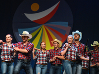 Members of 'Polonez' group from Edmonton, Canada, during their performance on the first day of the 17th edition of World Festival of Polish...