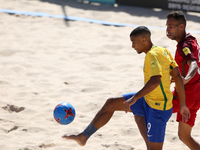 Brazil's forward Rodrigo vies with Portugal's defender Jordan during the Beach Soccer Mundialito 2017 match between Portugal and Brazil at t...