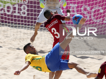 Brazil's midfielder Bruno Xavier (8) kicks the ball during the Beach Soccer Mundialito 2017 match between Portugal and Brazil at the Carcave...