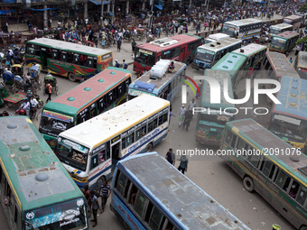 Hazardous road crossing made traffic jam in Dhaka, Bangladesh on July 23, 2017. Dhaka last 10 years, average traffic speed has dropped from...