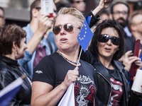 Polish protesters stand in front of the Embassy of Poland in Brussels. The protest takes place to oppose the Polish court reforms on July 23...