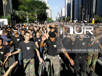 Protesters are participating in an act in support of the military police, organized by the Right Movement São Paulo, on Avenida Paulista, ce...