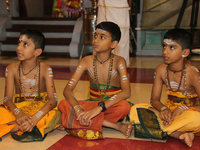 Tamil Hindu boys in training to become Hindu priests listen as a senior priest recites prayers during the Nambiyaandaar Nambi Ustavam Thiruv...