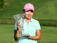 In-Kyung Kim of Korea holds up the trophy after winning the Marathon LPGA Classic during the final round of the golf tournament held a Highl...