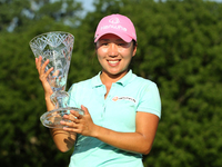 I.K. Kim of Korea holds the trophy after winning the tournament during the final round of the Marathon LPGA Classic golf tournament at Highl...