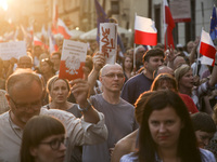 People protest at the Main Square against government plans for sweeping changes to Polands judicial system. Krakow, Poland on 23 July, 2017....