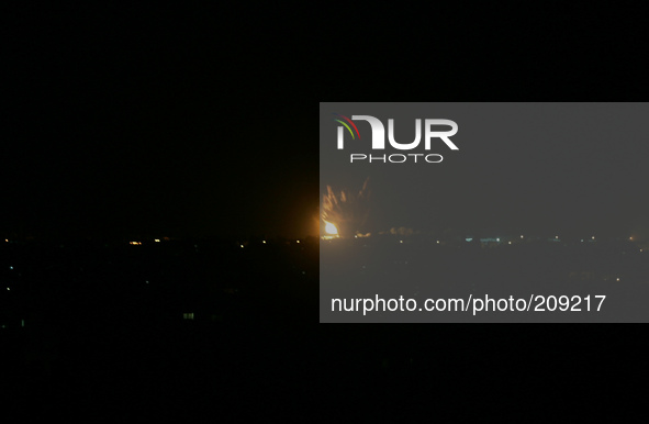 Smoke and fire billow following an Israeli air strike in Rafah in the southern of Gaza Strip on August 09, 2014. Israeli warplanes pounded t...