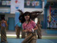 Palestinian children enjoy as part of the activities proposed during a Summer Fun Weeks 2017 organised by the United Nations, in Jabalia ref...