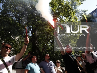 Activists of CI4 nationalistic group lit the flares as they demand to free Ukrainian soldier Vitaly Markiv in front of the Italian Embassy i...