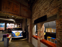 Large steel beams and exposed brick wall from the original structure are visible in the main lobby of the Fillmore Philadelphia. The enterta...