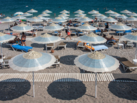 Beach Tourism in Antalya, Turkey, on 25 July 2017. Antalya, the largest city on Turkey's Mediterranean coast, is normally a popular summer d...