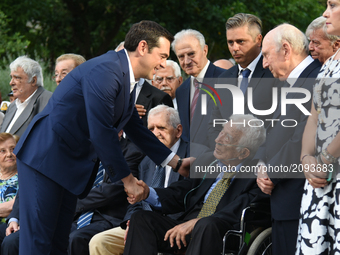 Prime Minister Alexis Tsipras greeting members of the resistance against the military dictatorship of Greece (1967-74) on the occasion of th...
