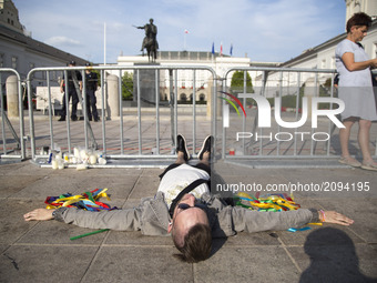 Man lays down during protest against government plans of changes to Poland’s judicial system in Warsaw on July 25, 2017.
 (