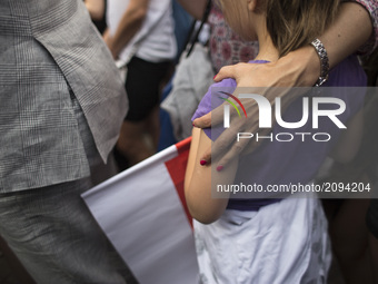 Girl holds polish flag during protest against government plans of changes to Poland’s judicial system in Warsaw on July 25, 2017.
 (